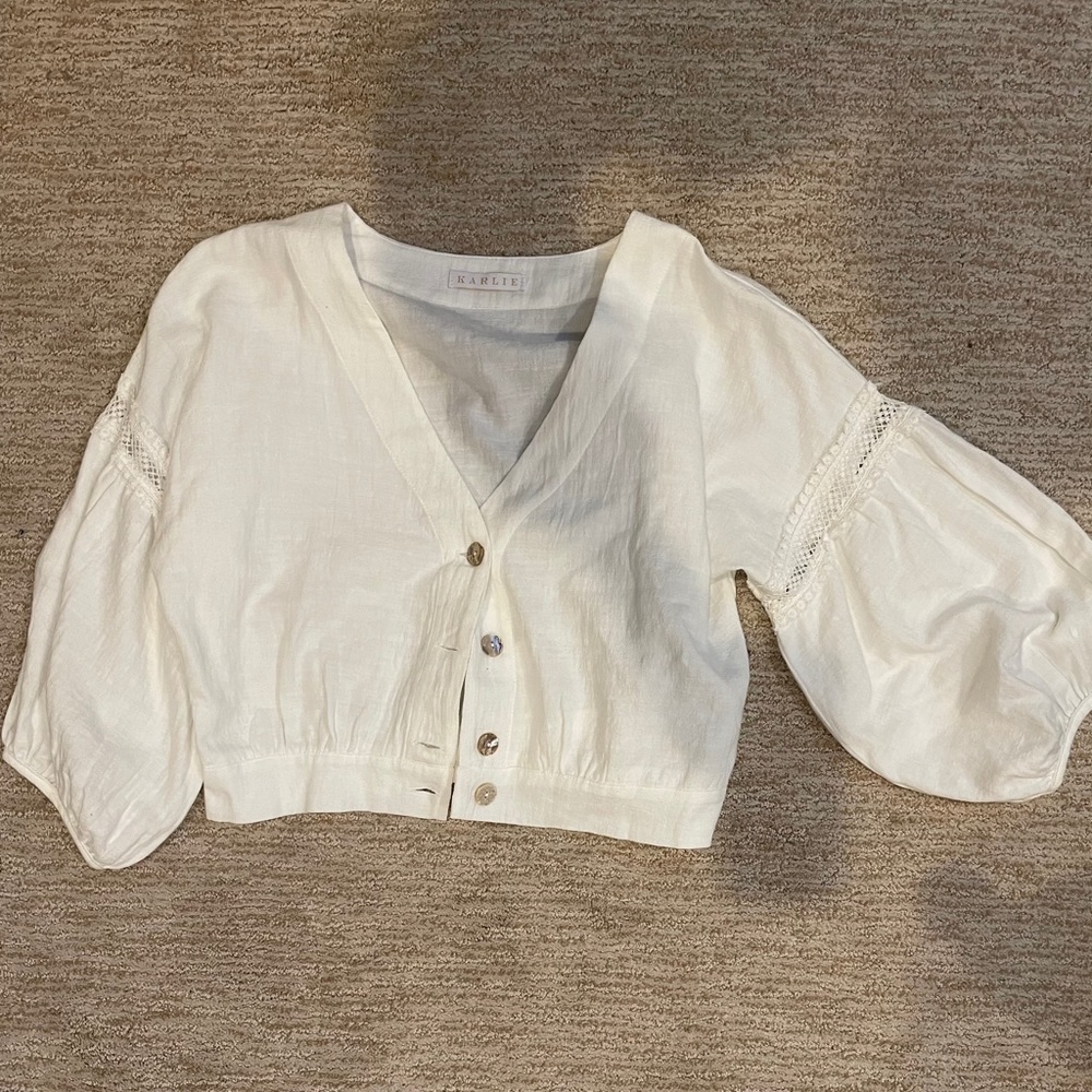 White statement sleeve crop top